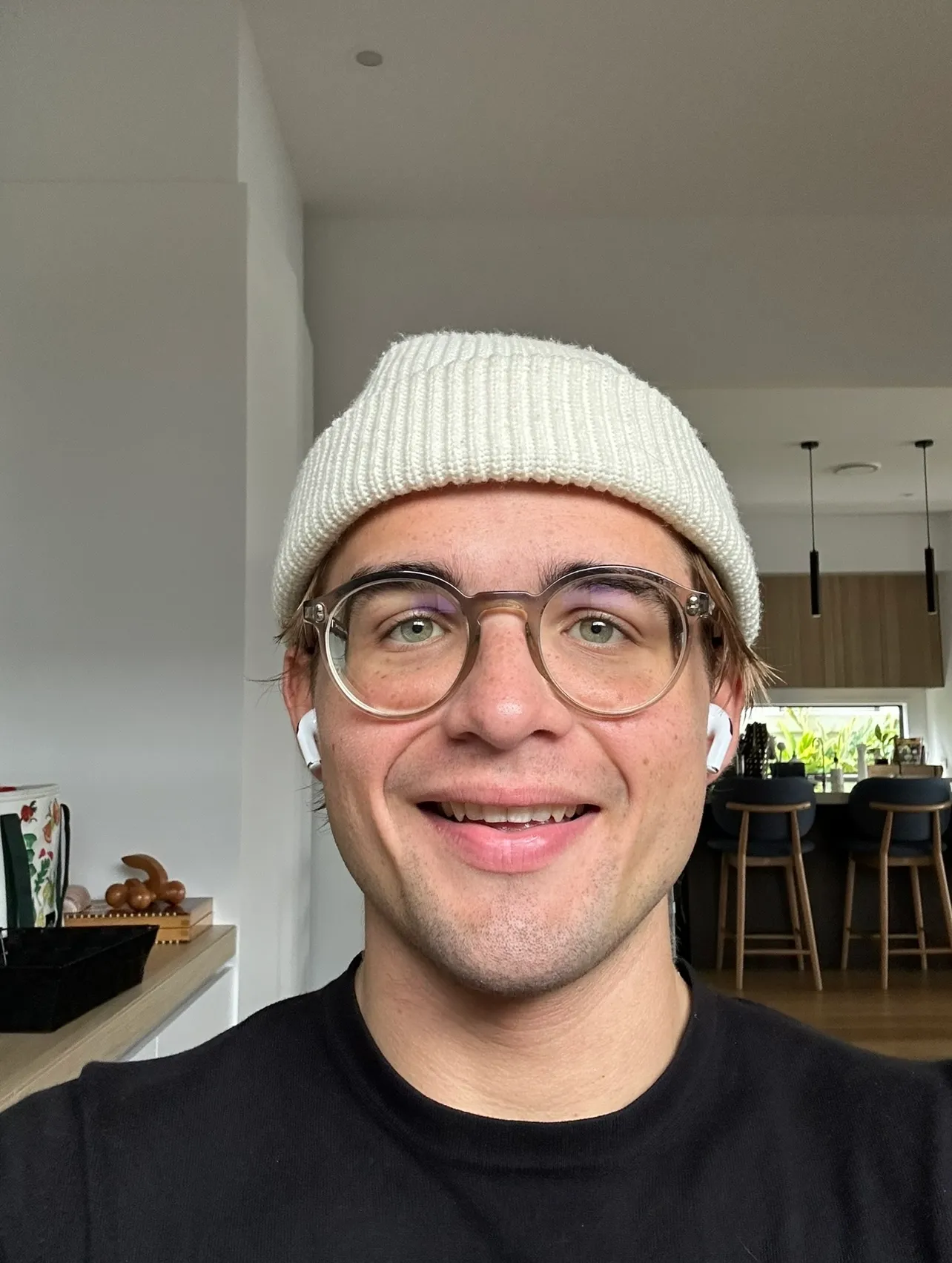 Person smiling to unlock phone