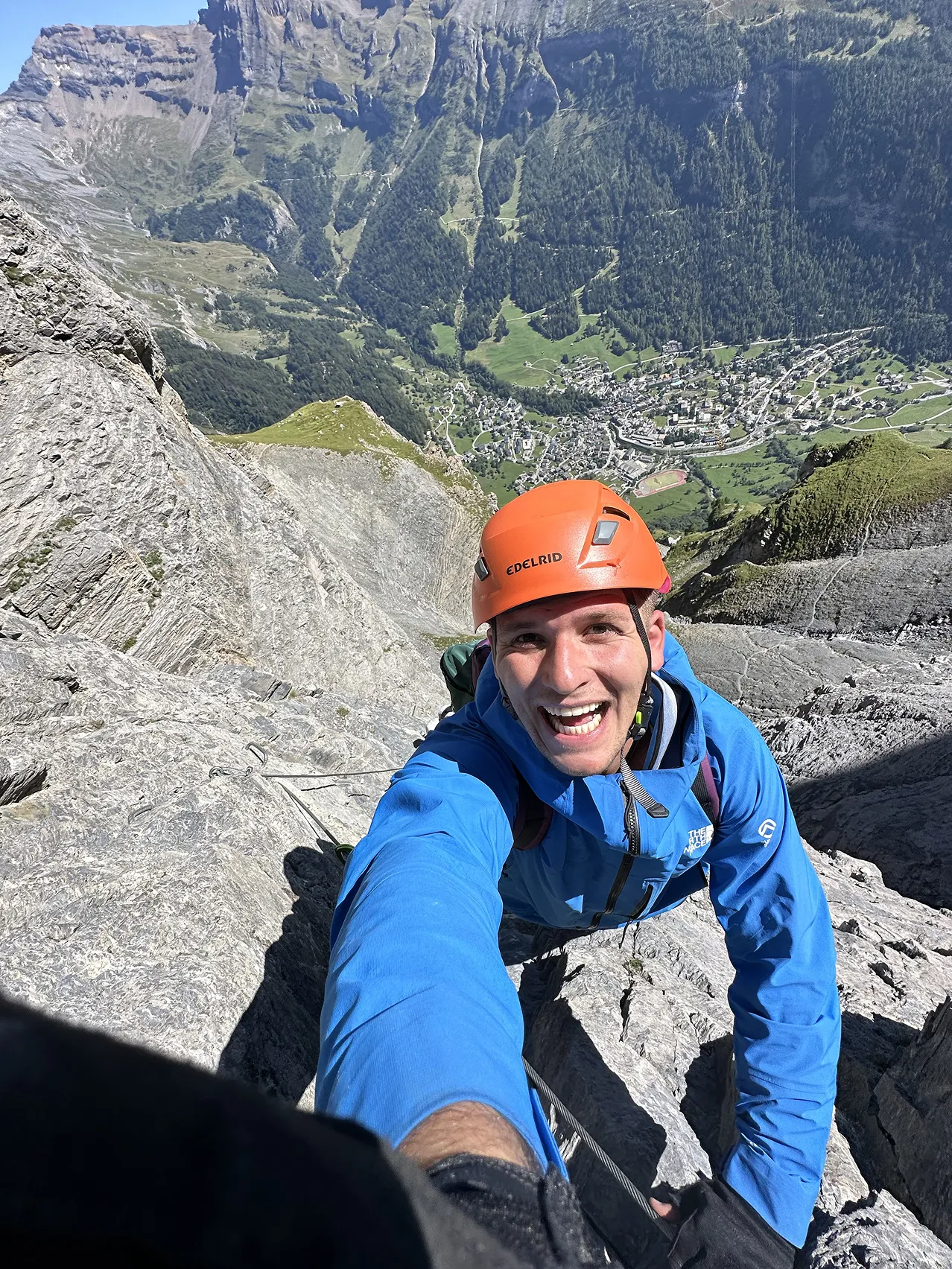 Person smiling to unlock their phone